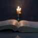 scriptures-candles-wooden-table